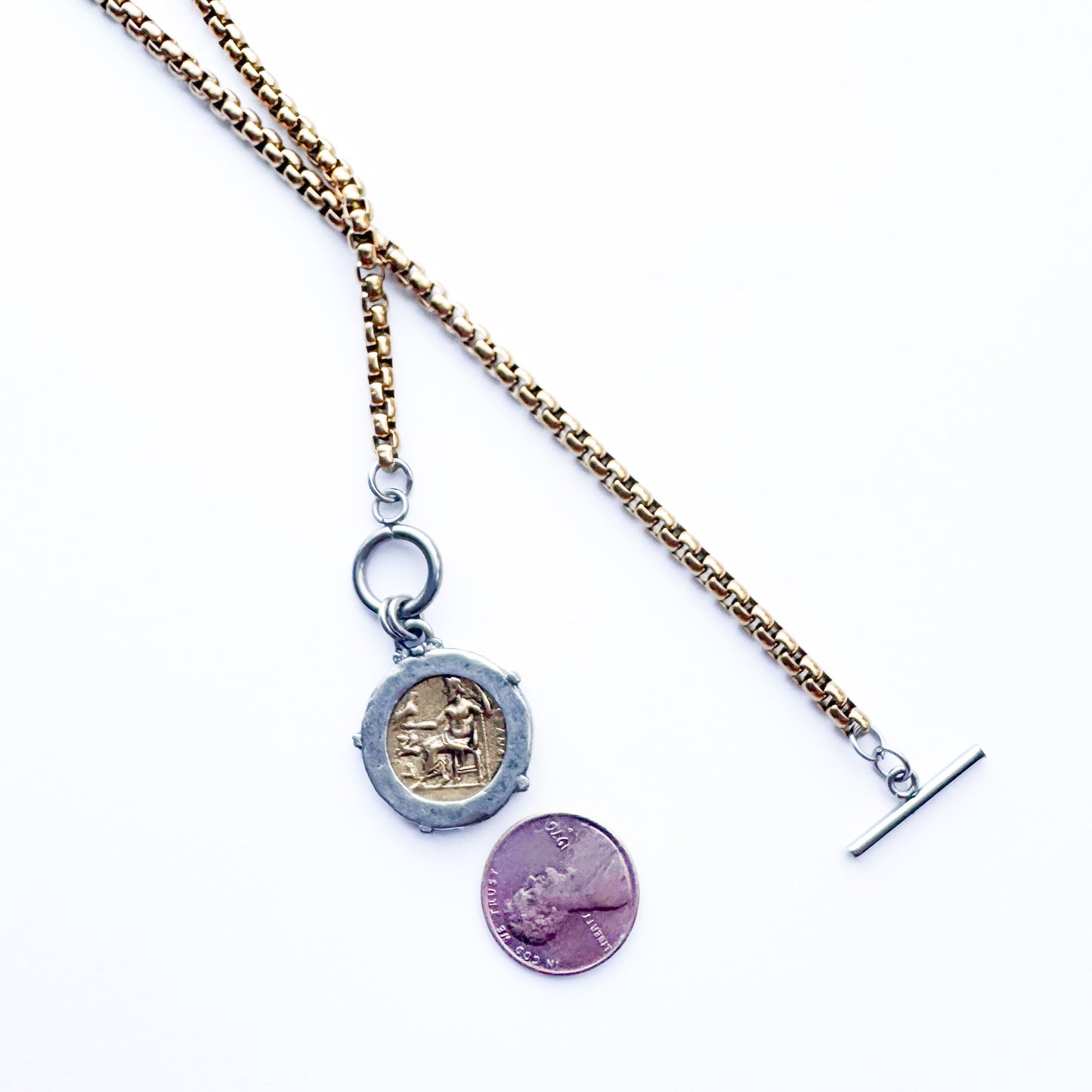 Necklace with a pendant on a white background