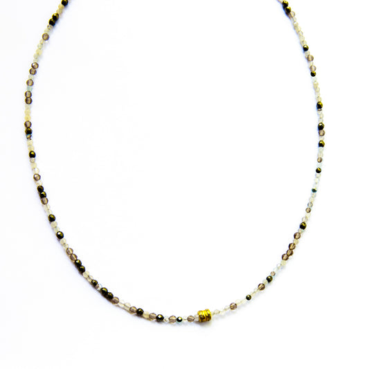 Necklace with small beads on a white background