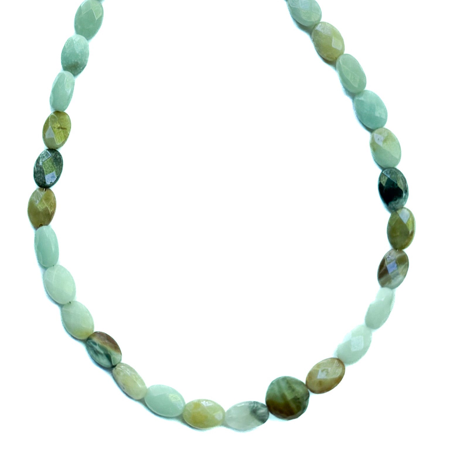 Necklace with green and brown beaded chain on a white background