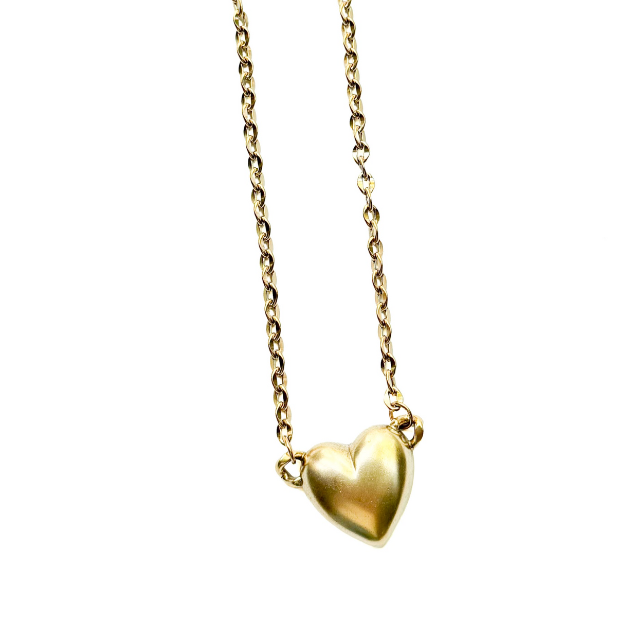 A gold heart pendant necklace on a gold chain, shown on a plain white background.