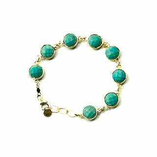 Turquoise beaded bracelet on a white background