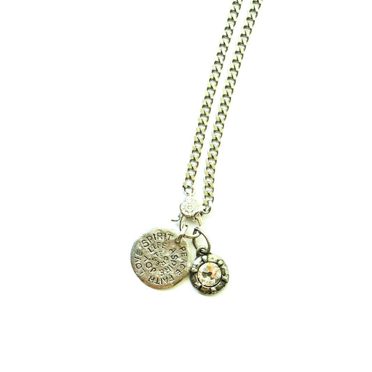 Silver necklace with two pendants on a white background