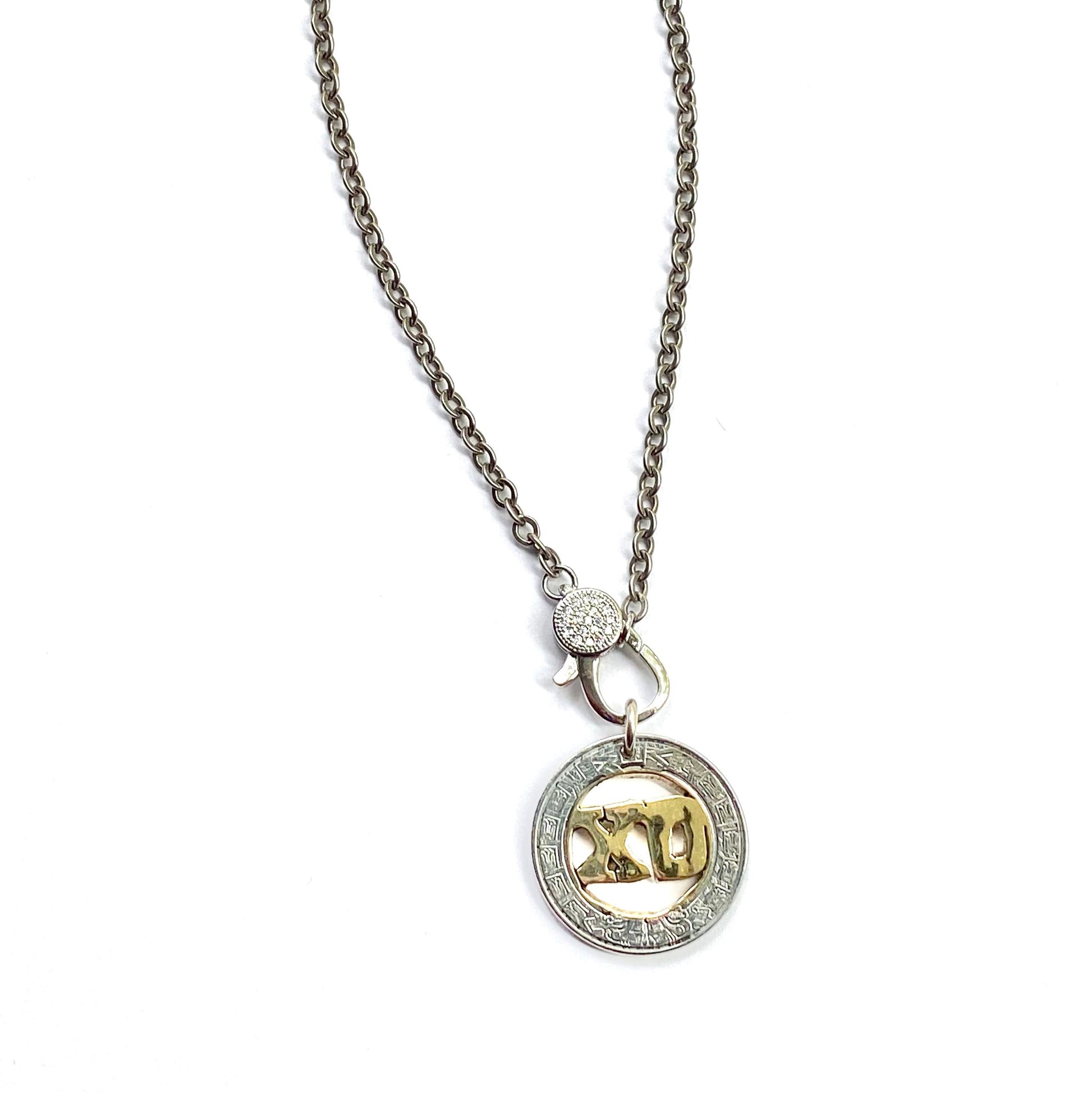 Necklace with a round pendant featuring a bear design on a white background