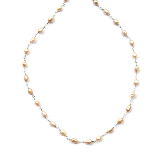 Pearl necklace on a white background